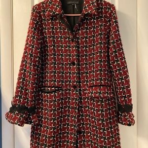 Very chic long blazer/jacket with a ruffle sleeve